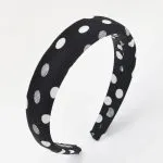 Bandeau rembourré noir pour cheveux avec motif à pois blancs