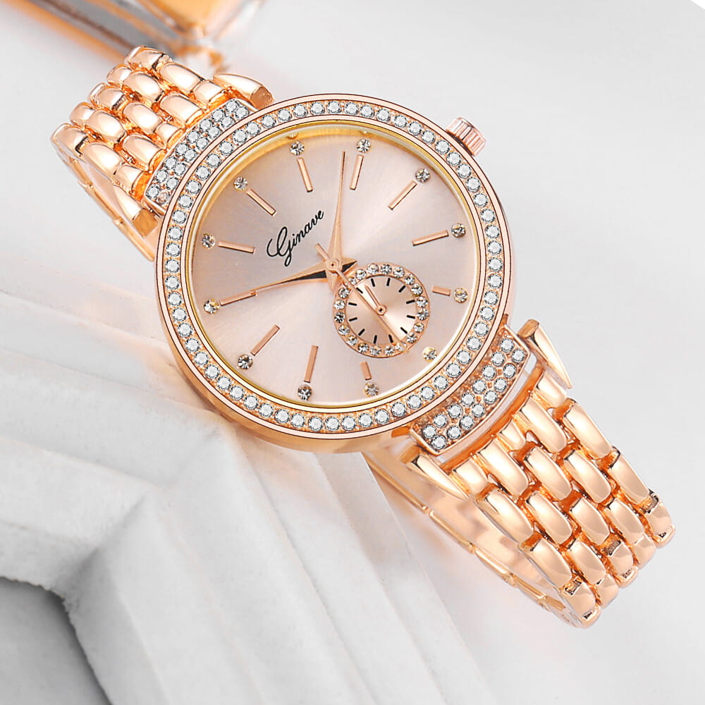 Montre femme or rose style luxe Montre femme analogique or rose avec cadran serti de cristaux