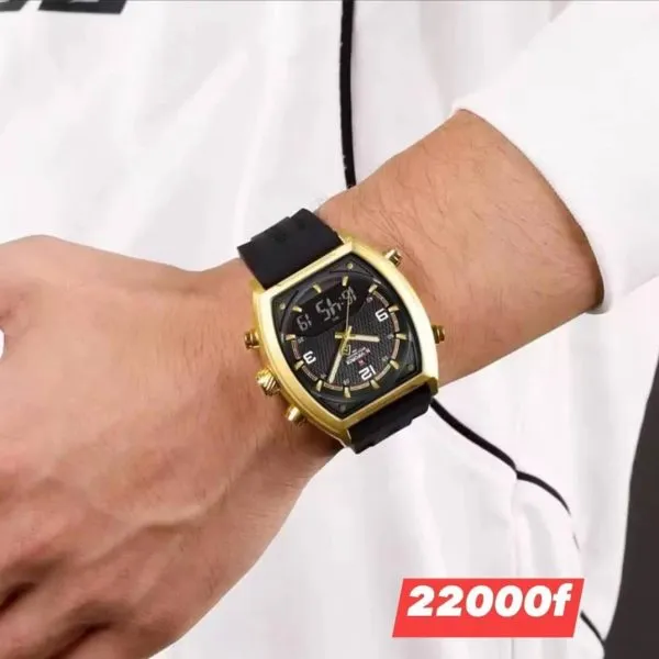Montre NAVIFORCE dorée et noire portée au poignet